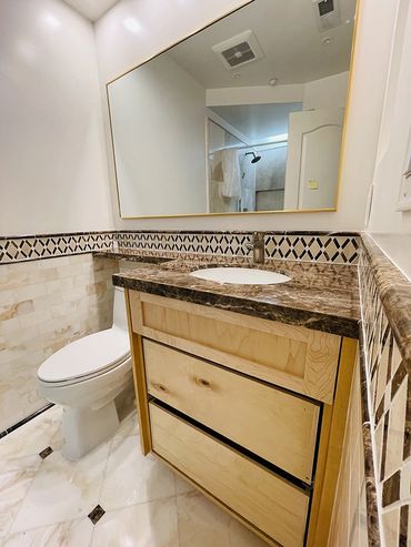 remodeled  toilet and a sink