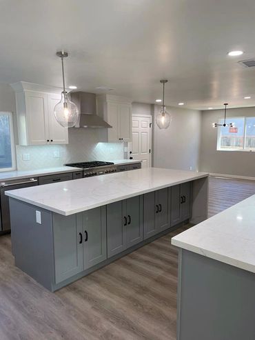 kitchen renovation photo, kitchen island with gray cabinets, stove