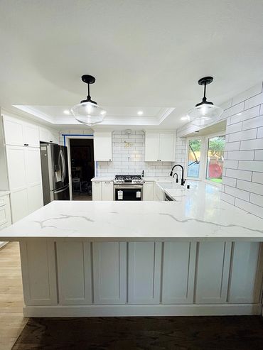 white breakfast area on remodeled kitchen