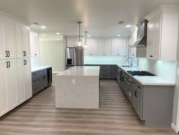 kitchen photo, kitchen island with gray cabinets, stove, pantry on the left