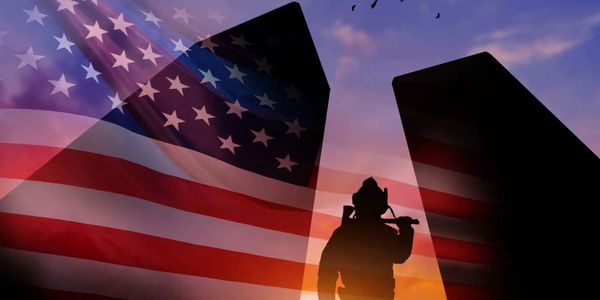 First responder standing with american flag background