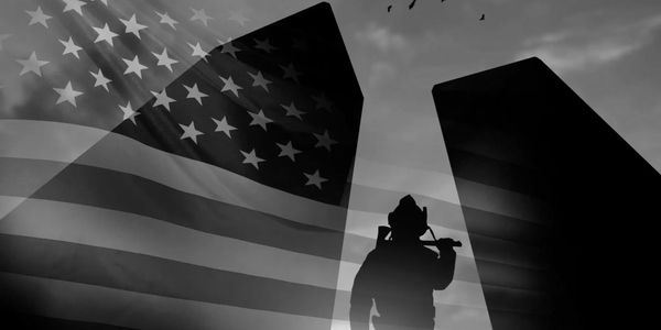 First responder standing with american flag background
