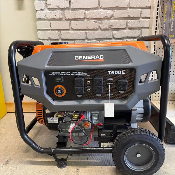 Orange and gray Generac 7500E portable generator with wheels and control panel.