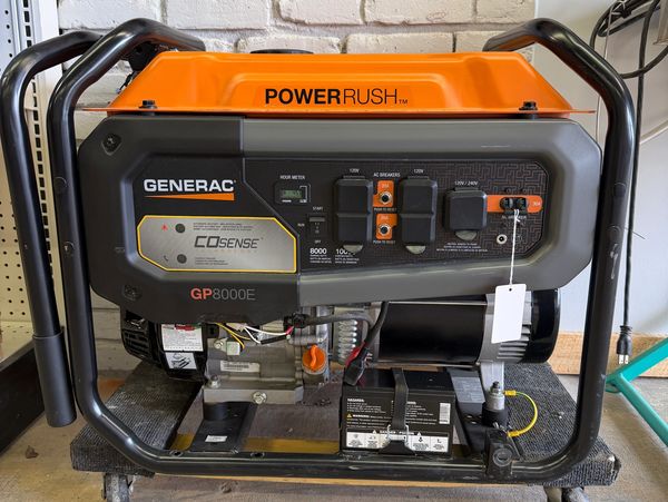 Generac GP8000E portable generator with orange and black casing.