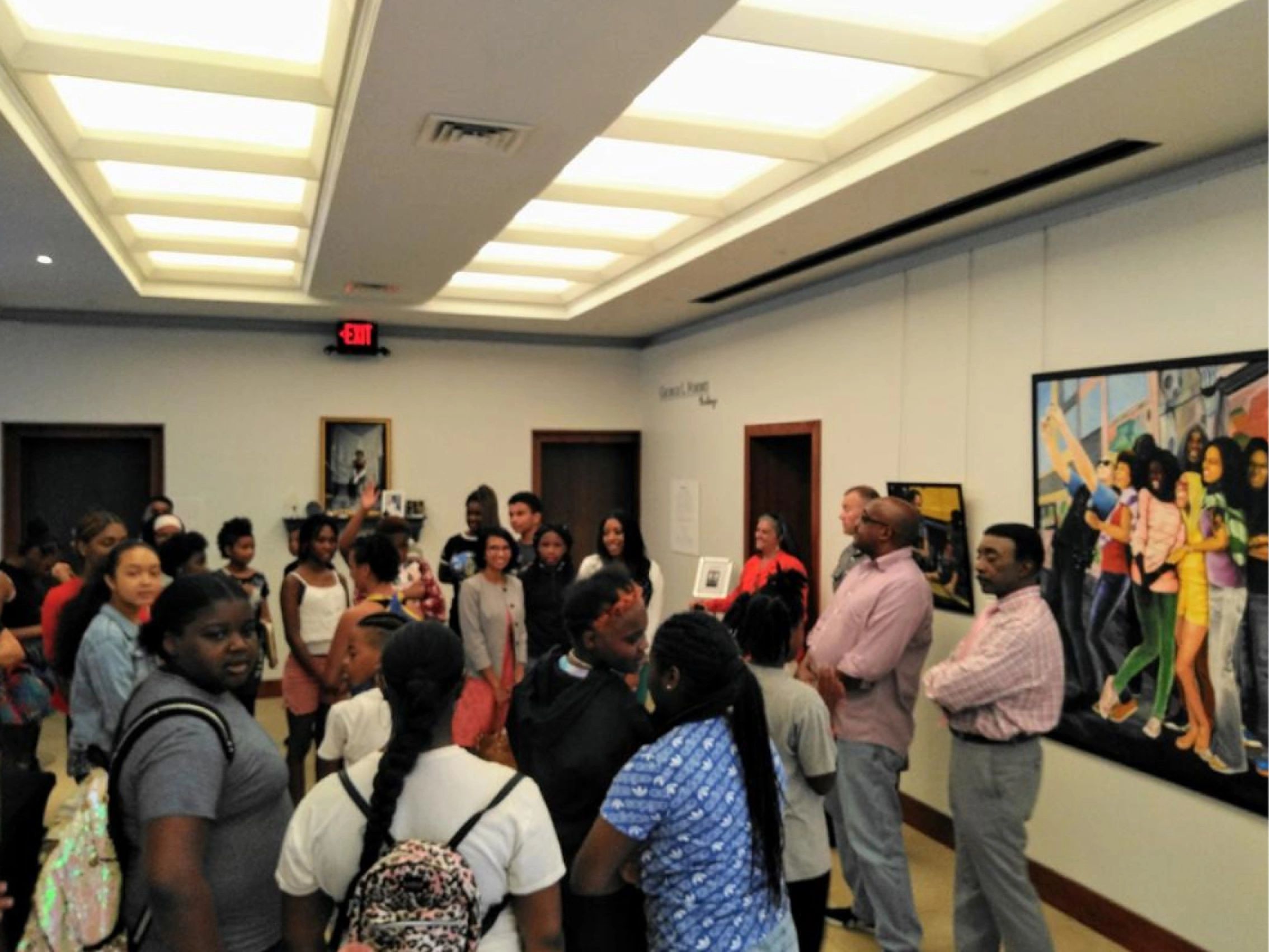 Group of teens at an exhibition 