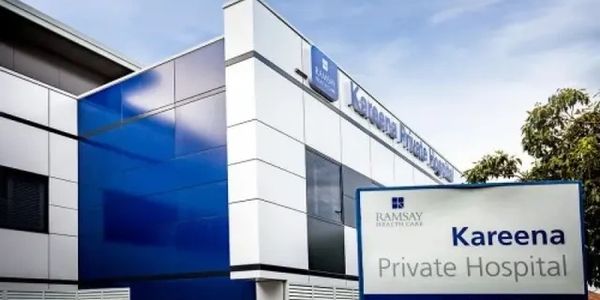 Modern Kareena Private Hospital building with clear signage.