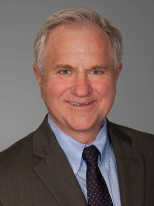 S. Reed Morgan portrait on a soft gray background