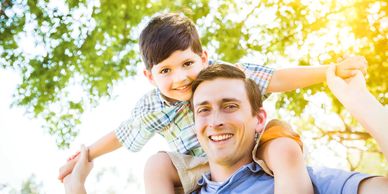 A father and son. 