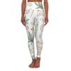 White leggings with green and beige plant and leaf patterns.