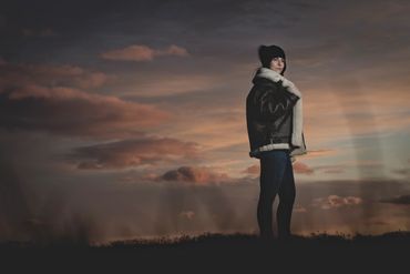 Sunset portraits with a fur lined coat.
