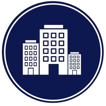 White building icons inside a dark blue circle.