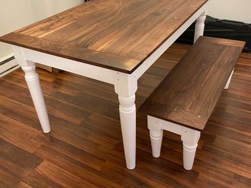 A classic Farmers style dining room table and bench with hand turned legs. The tops are made of blac