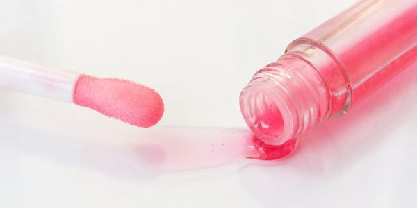 Lip Gloss color of Goal Digger pink from our Love Me Lip Gloss collection.