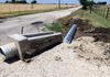 Extending a culvert drainage pipe in Sanger, Texas.