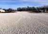 Road base gravel for a parking lot in Roanoke, Texas.