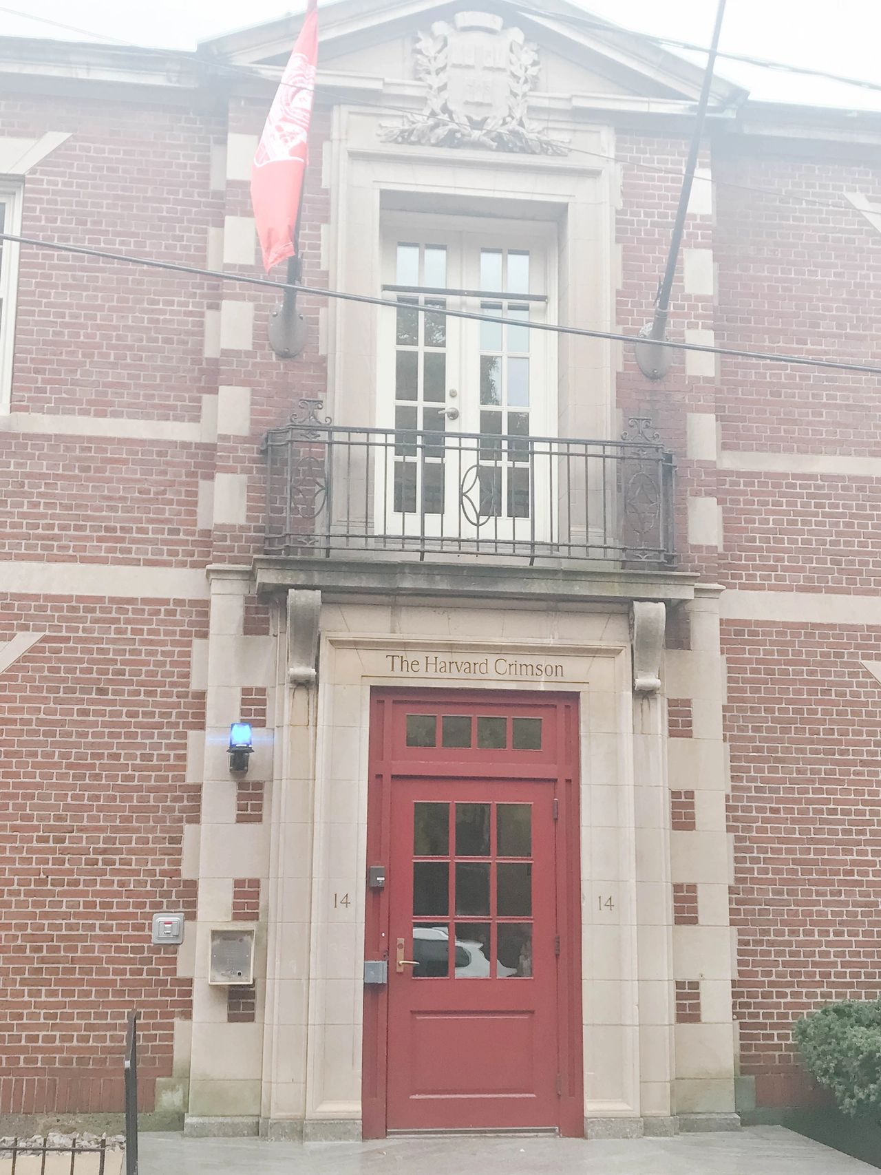 An exterior shot of the Harvard Crimson