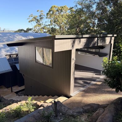 Modern garage with open door on a sunny day.