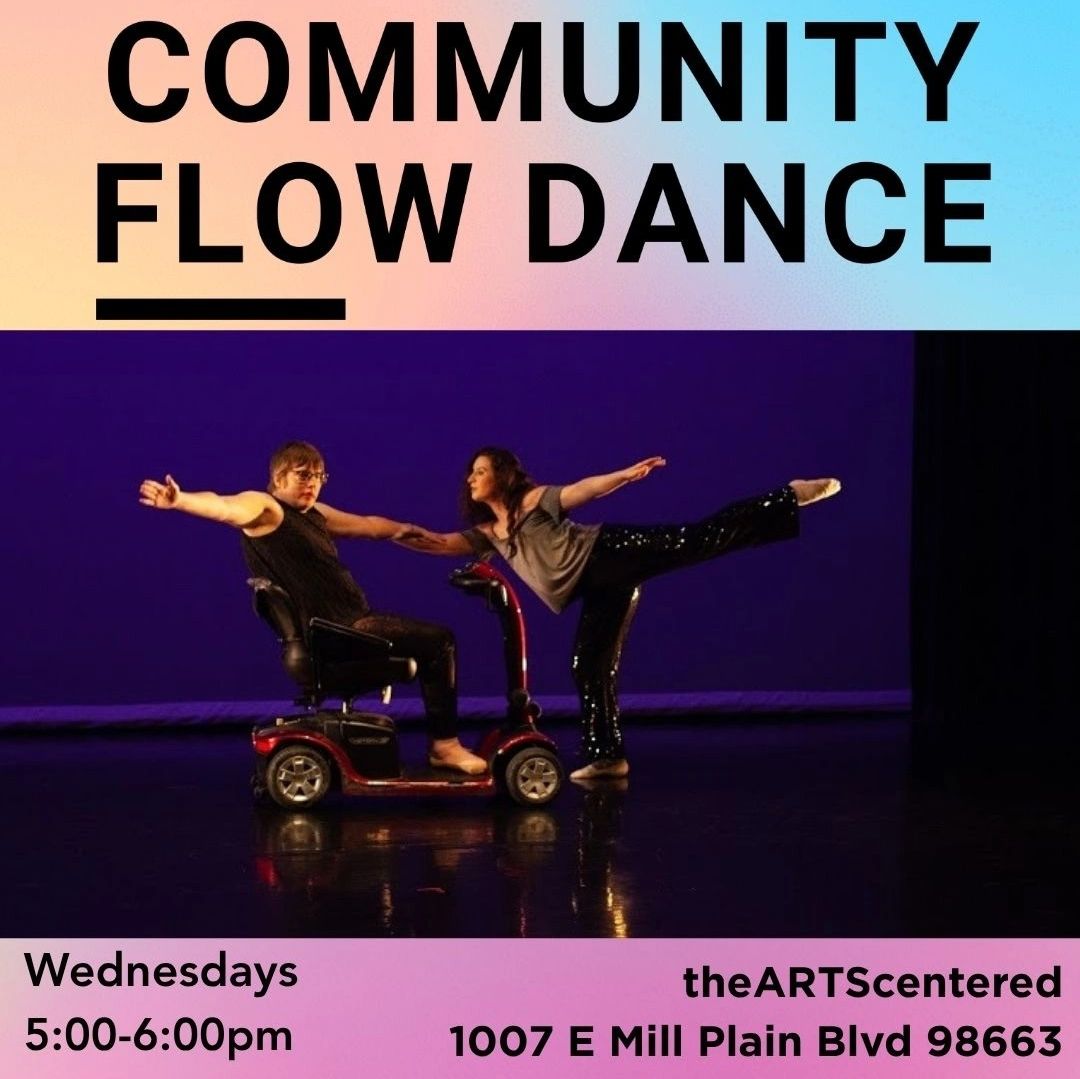Inclusive dance session with wheelchair and standing dancer.