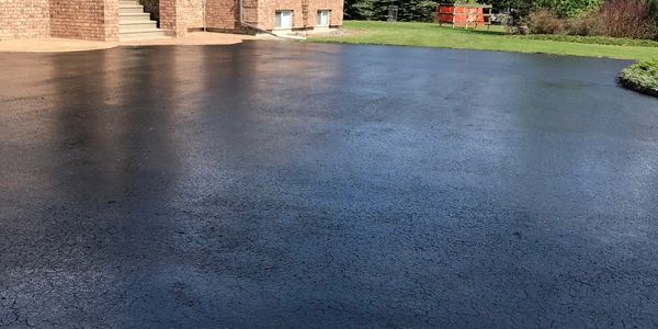 Sealant applied to driveway.