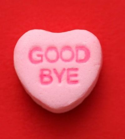 Good Bye pink candy gram laying on a red background