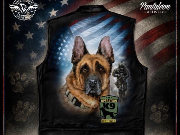 Leather vest with painted German Shepherd and soldier.