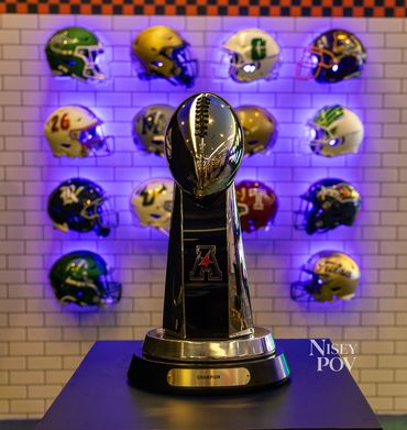 Football figurine statue at the  2026 American Conference Kickoff at the Hilton Bayfront in St. Pete
