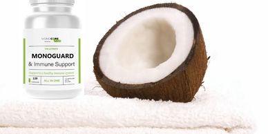 Coconut and immune support capsules on the towel