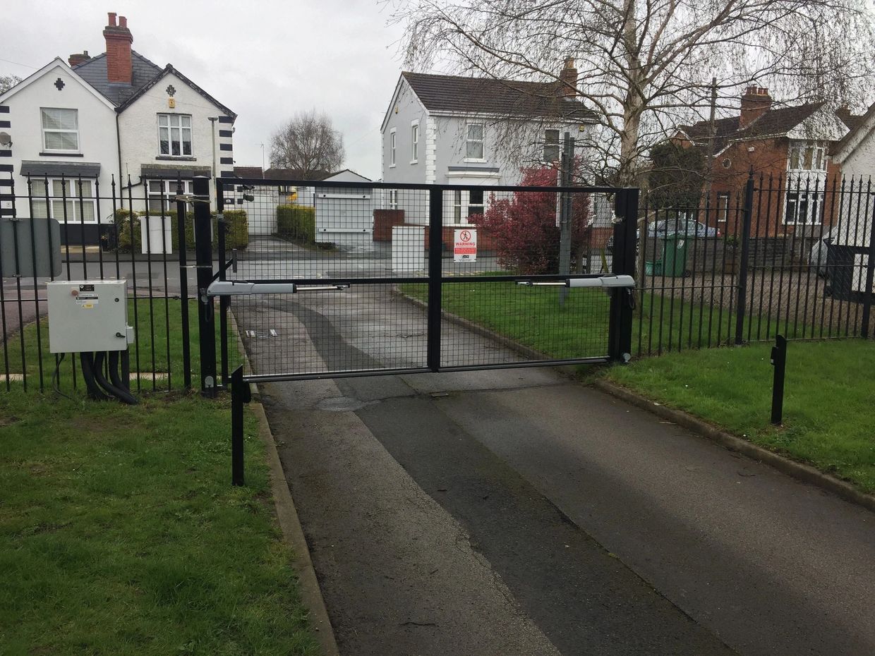 Electric metal swing gates installed at a school