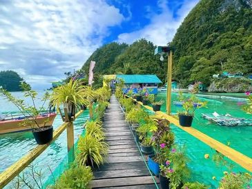 Jmalls island wooden boardwalk with plants in Dinagat Islands Philippines