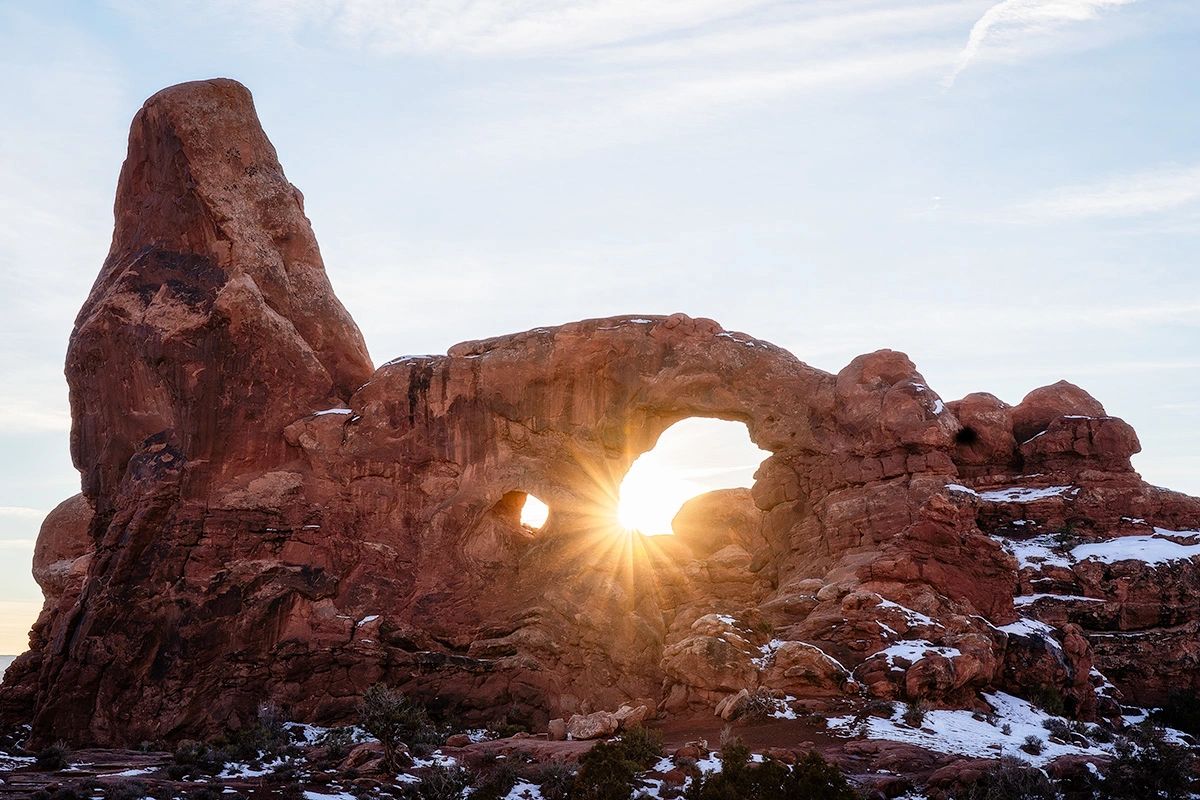Sun Burst Through Turret Arch in Arches National Park