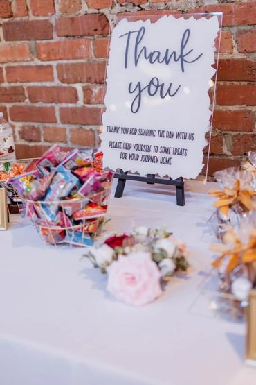 Thank you sign, sweets, exit table, faux florals, white linen, brick wall, candy, custom, vinyl