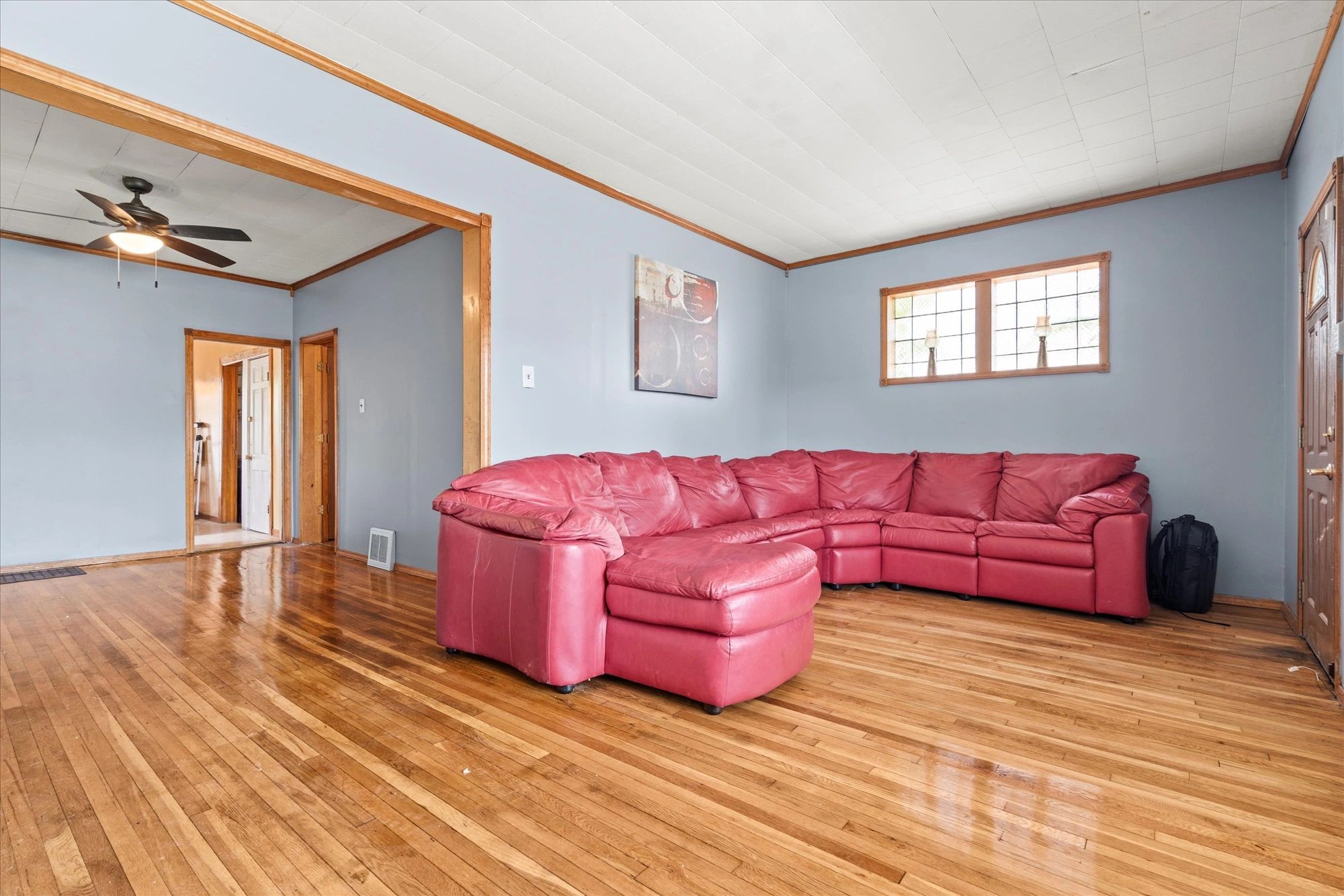 By Handymen on the Spot LLC, featuring beautifully finished hardwood floors, fresh interior painting