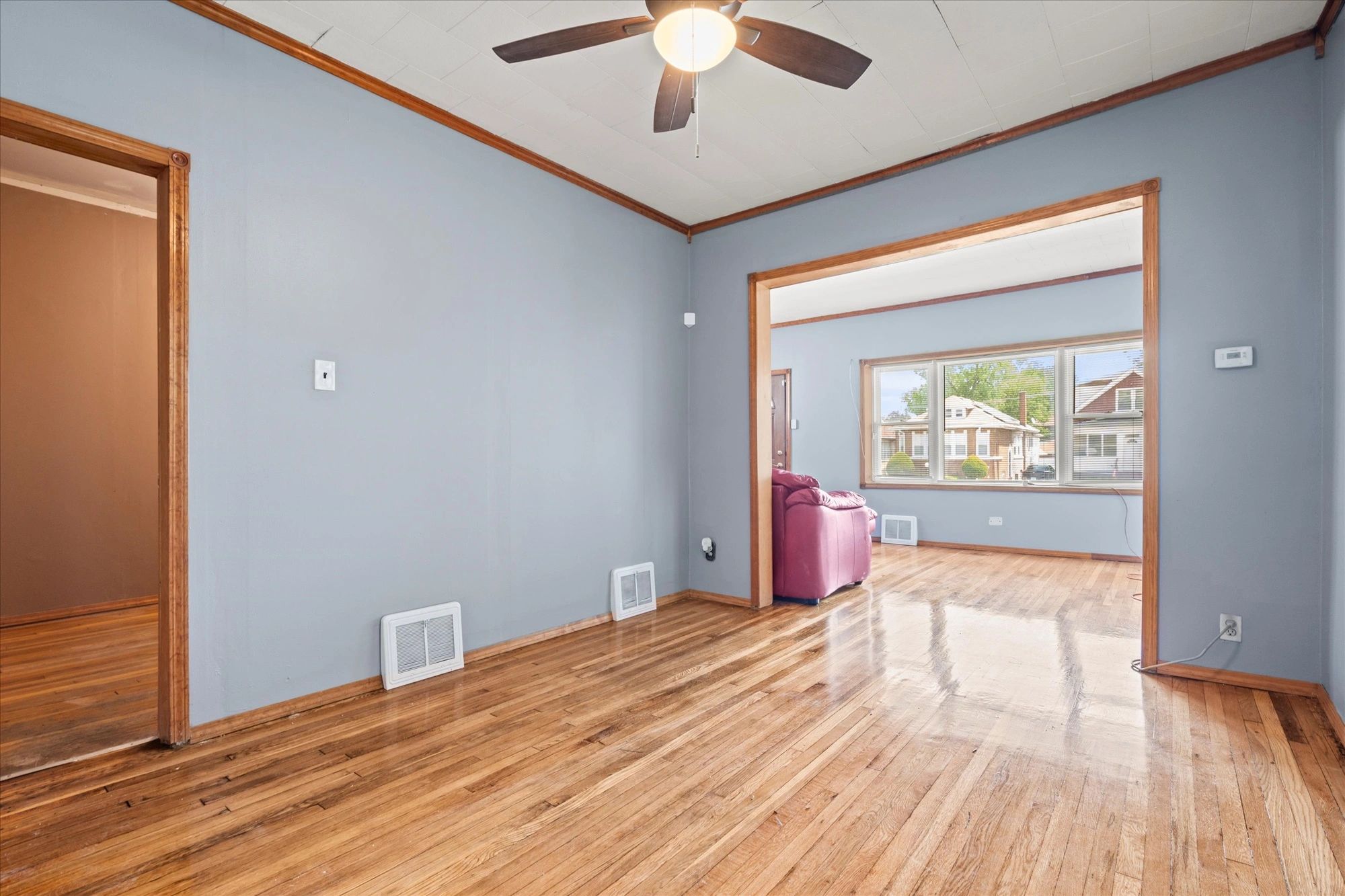 By Handymen on the Spot LLC, featuring beautifully finished hardwood floors, fresh interior painting