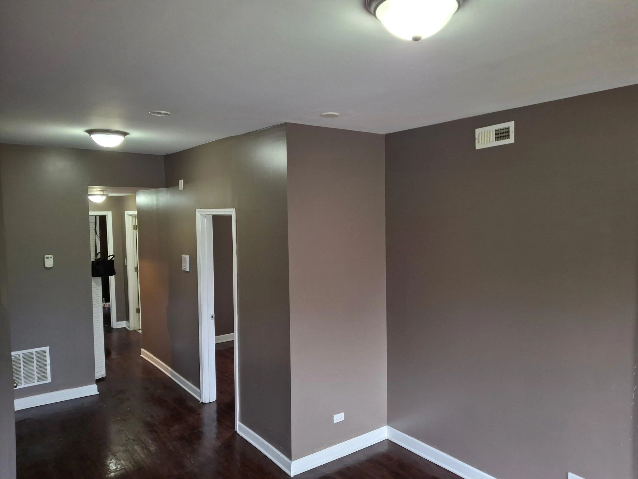 By Handymen on the Spot LLC, featuring beautifully finished hardwood floors, fresh interior painting