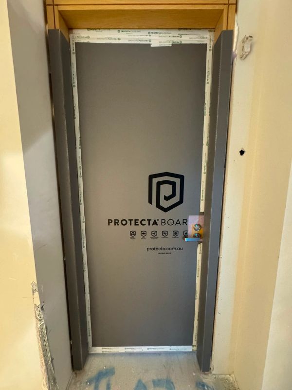 Door with Protecta Board installed for fire protection.