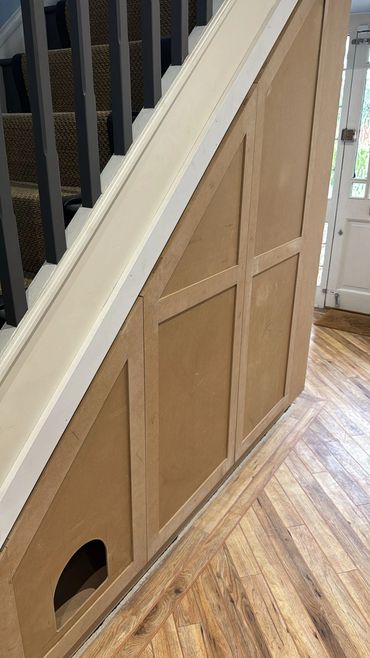 Shaker style under stairs storage
