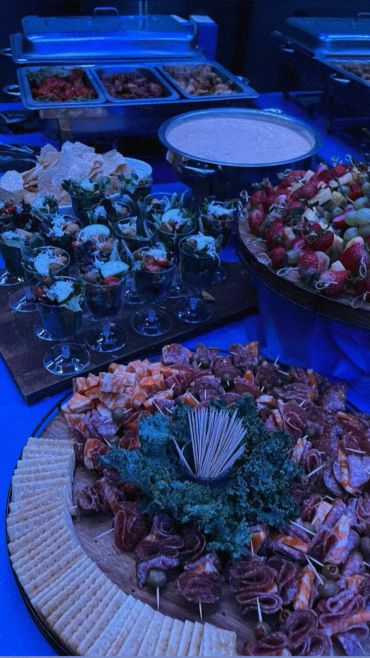 Buffet table with appetizers and snacks.