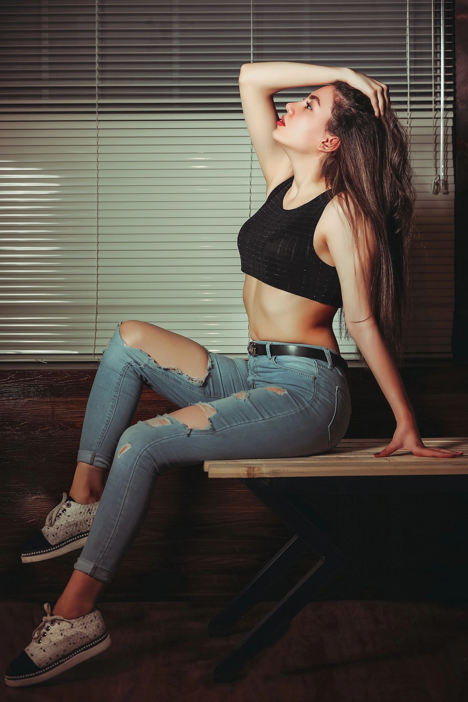 Stylish low-key lighting portrait session in North York . Bold fashion-inspired lighting portrait in