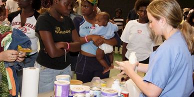 image of mothers receiving formula support at a shelter.