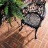 Brick flooring set in basketweave pattern on patio