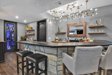 bar - wet bar - island - stools - backsplash - lighting