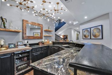 bar - wet bar - island - stools - backsplash - lighting