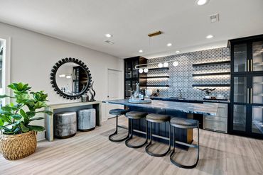 bar - wet bar - island - stools - backsplash - lighting