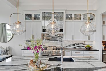 Kitchen island - lighting - cabinets