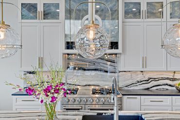 Kitchen island - lighting - cabinets