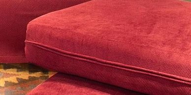 Boxed seat cushions with hidden zipper.