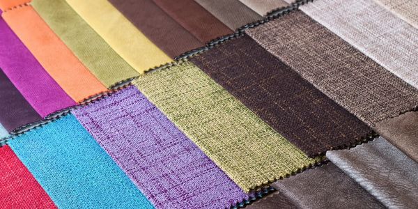 Swatches of upholstery fabric, vinyl and leather.