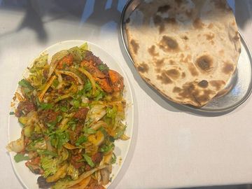 All tandoori meat mixed with spice & salad  served with roti