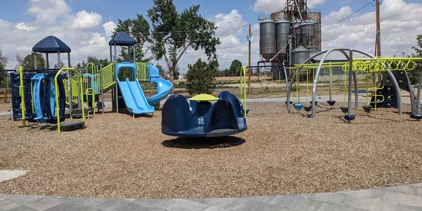 A childrens park with small rides.