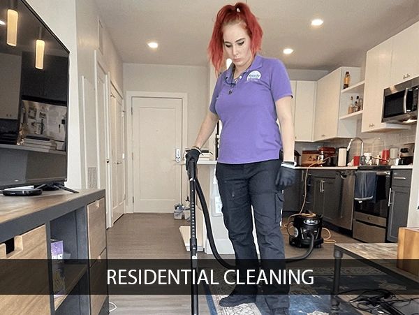 A woman doing residential cleaning services of a home